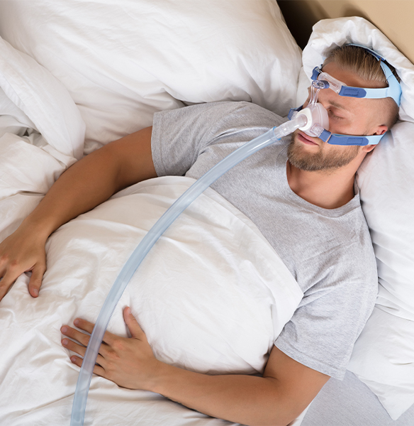 Man using combined sleep apnea therapy sleeping soundly