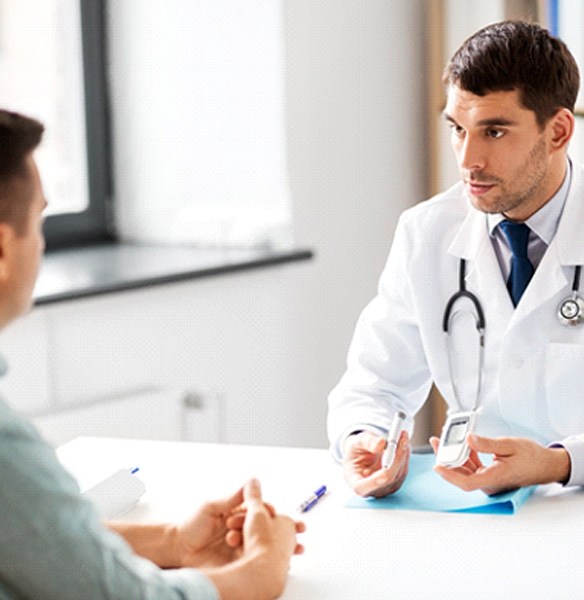 Doctor and patient discussing diabetes, a possible CSA complication