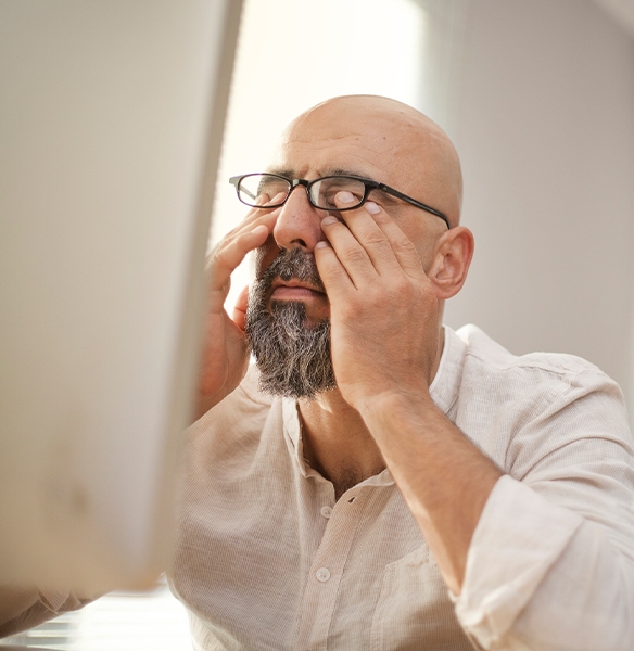 Tired man in need of oral appliance therapy for sleep apnea