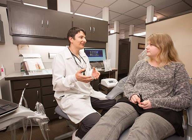 Doctor Paskalev talking to a sleep apnea patient in Eugene