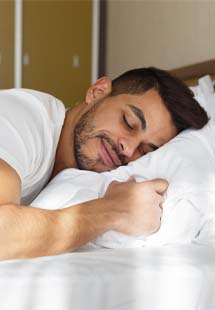 Man sleeping peacefully on his side