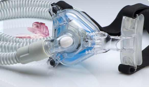 Pink oral appliance and C P A P system for sleep apnea treatment